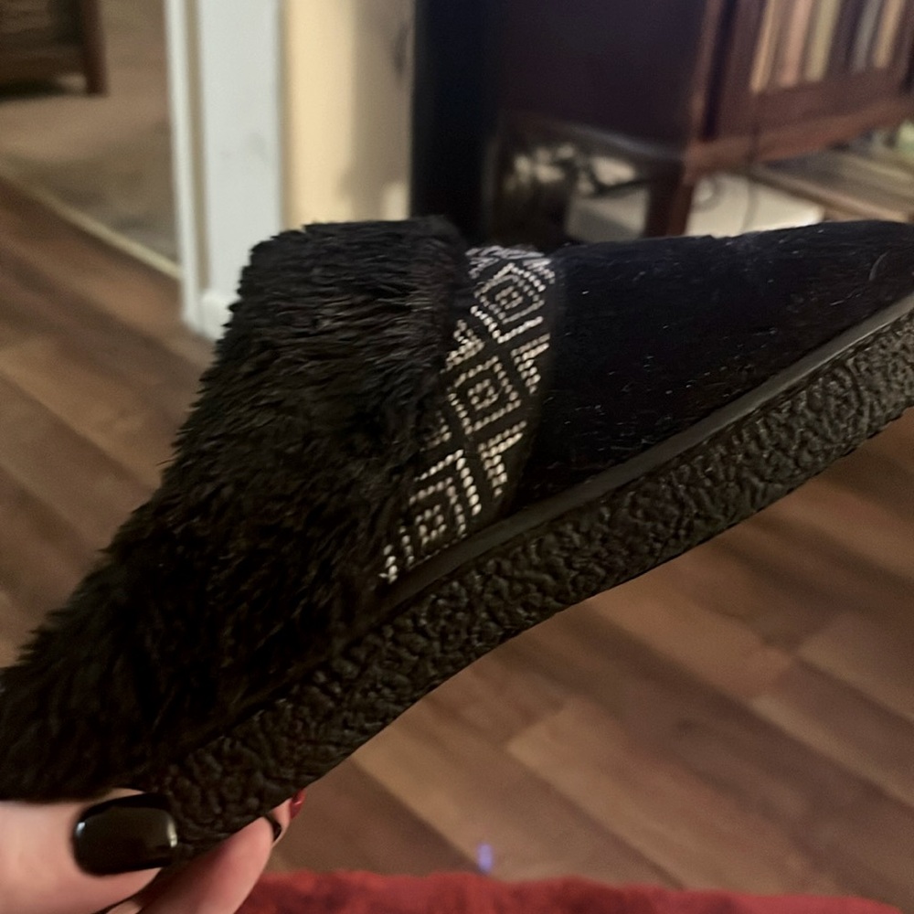 Like a house slipper but can be worn outside similar to uggs